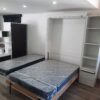 Cama Rebatible con módulo lateral