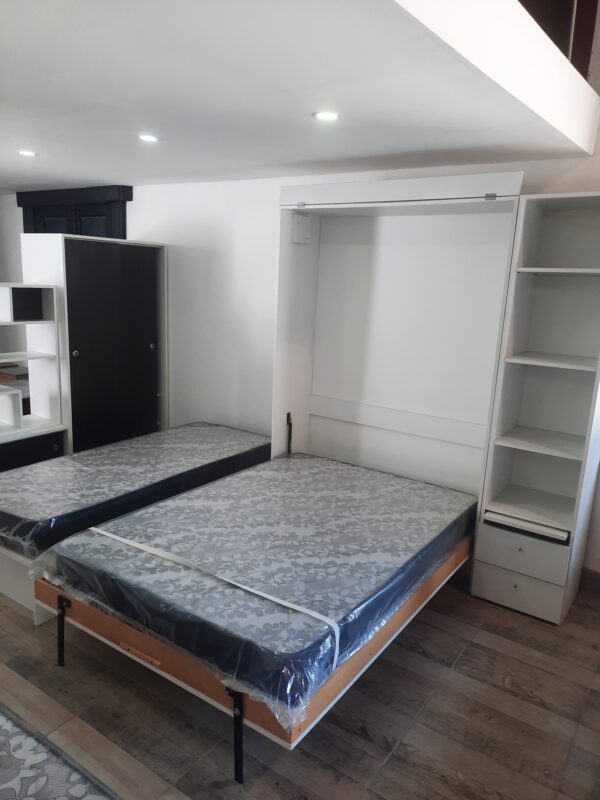 Cama Rebatible con módulo lateral